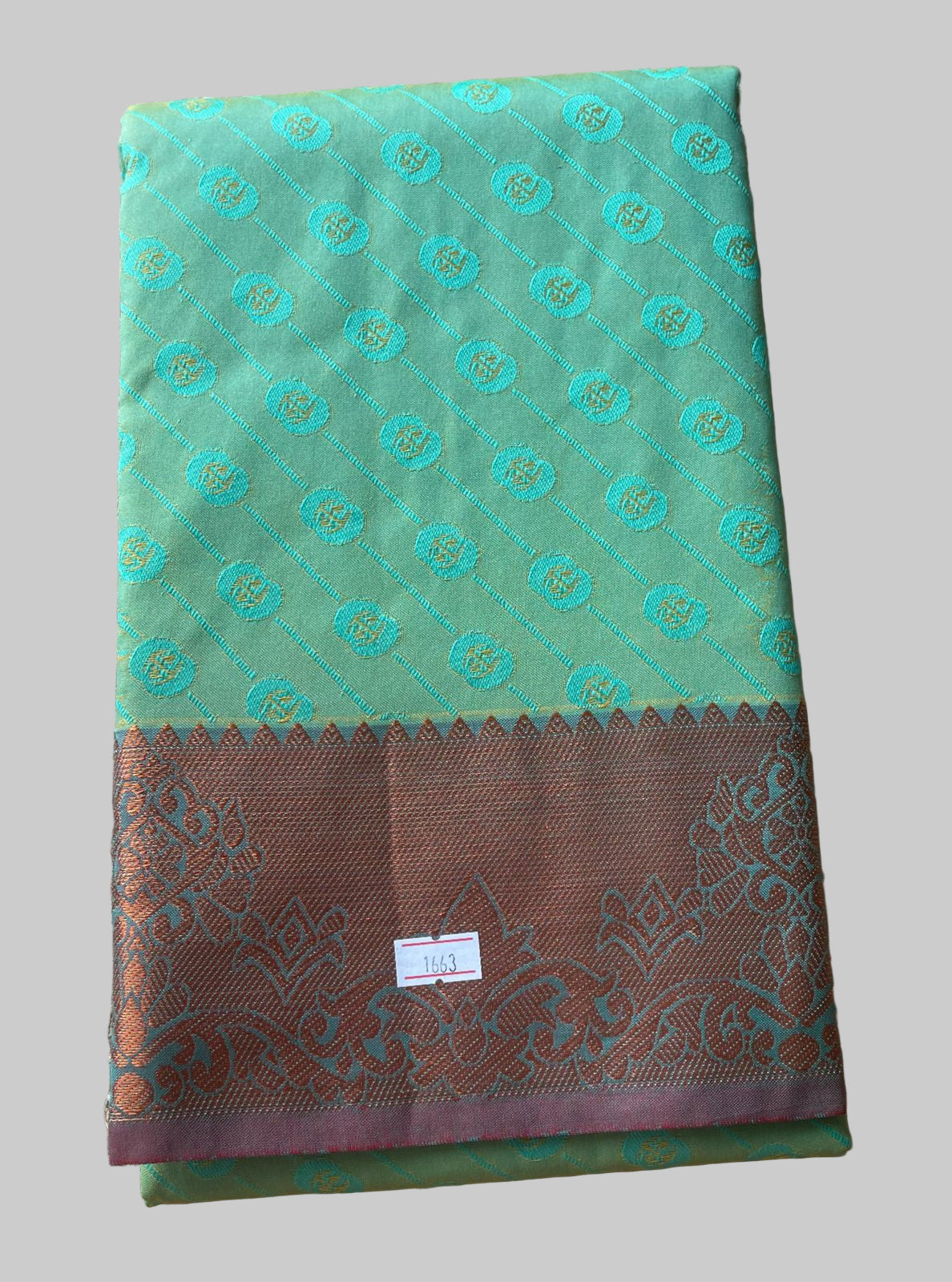 Saree - Green Silk Saree with Copper Zari Border