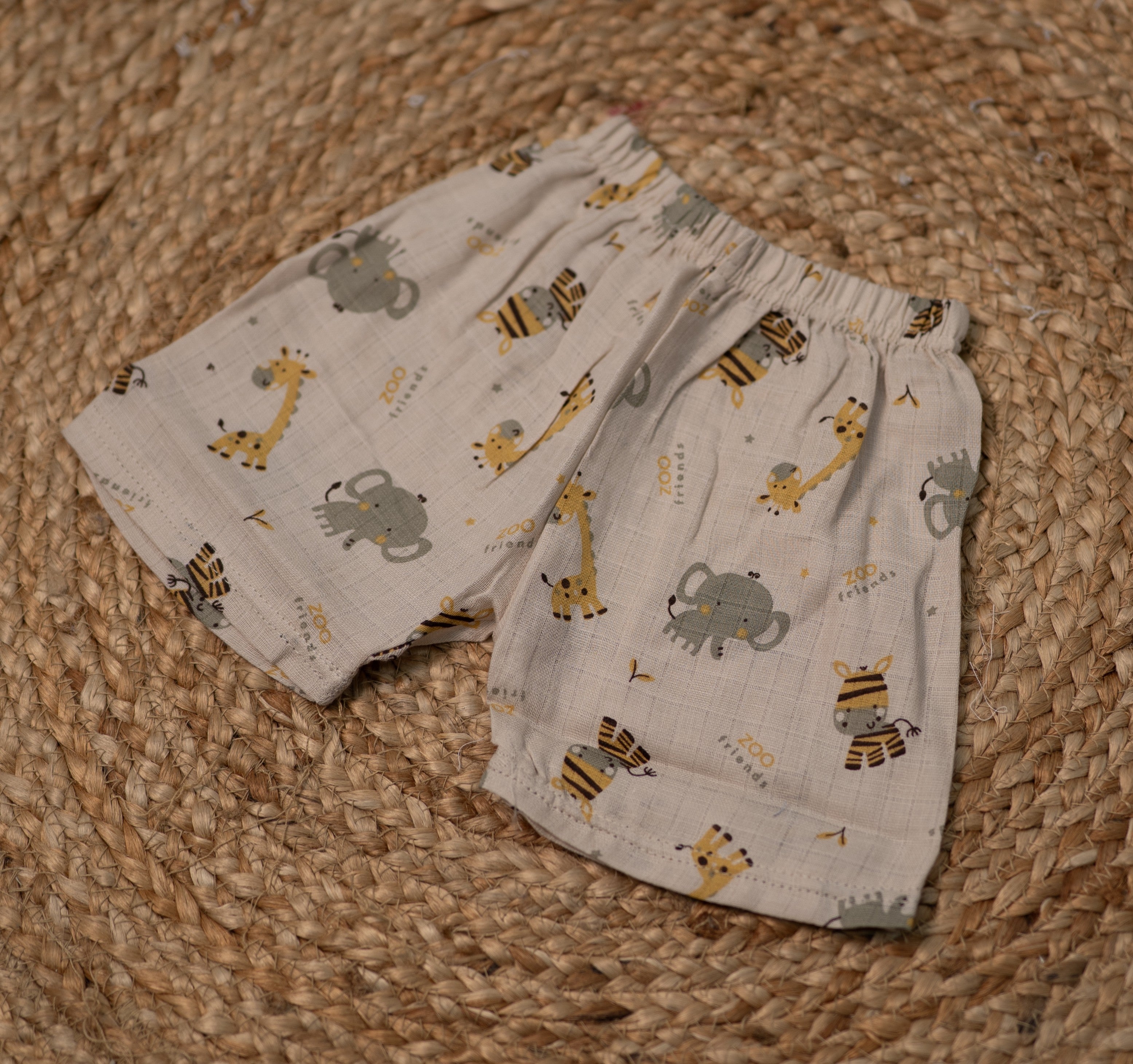 Girls shorts and top - light beige or cream color